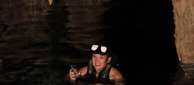 Kellie swimming in a cenote